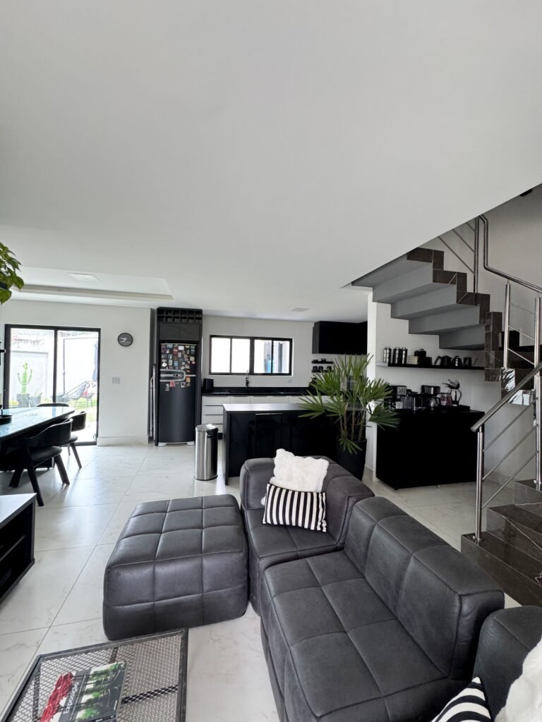 clean bachelor pad with black couch