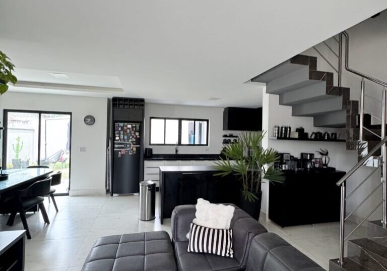 clean bachelor pad with black couch