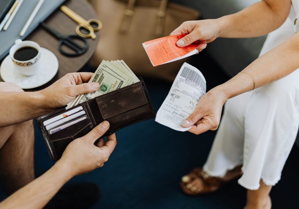This <a href="https://www.pexels.com/photo/person-getting-money-out-of-a-wallet-4968499/">Photo</a> was taken by <a href="https://www.pexels.com/@karola-g">www.kaboompics.com</a> on Pexels.